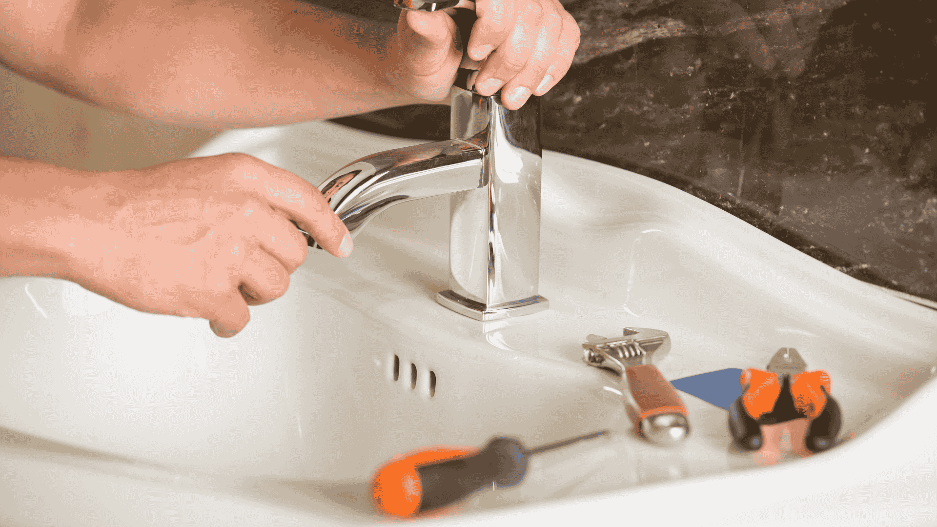 Native Plumbing LLC installer fitting a bathroom faucet in Jefferson County, TN.