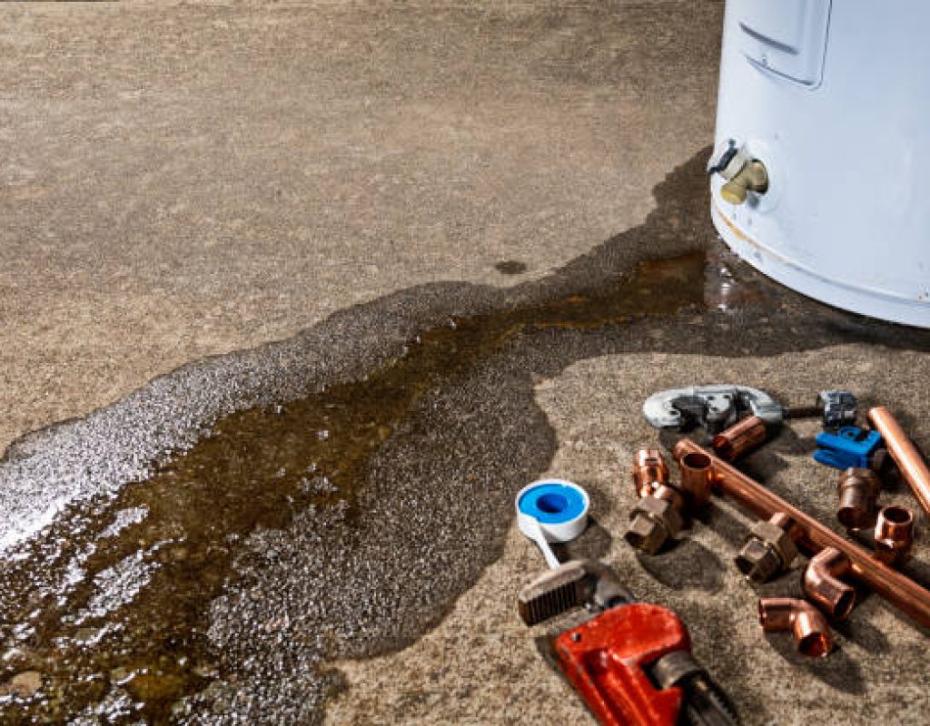 Native Plumbing LLC performing maintenance on gas water heater system