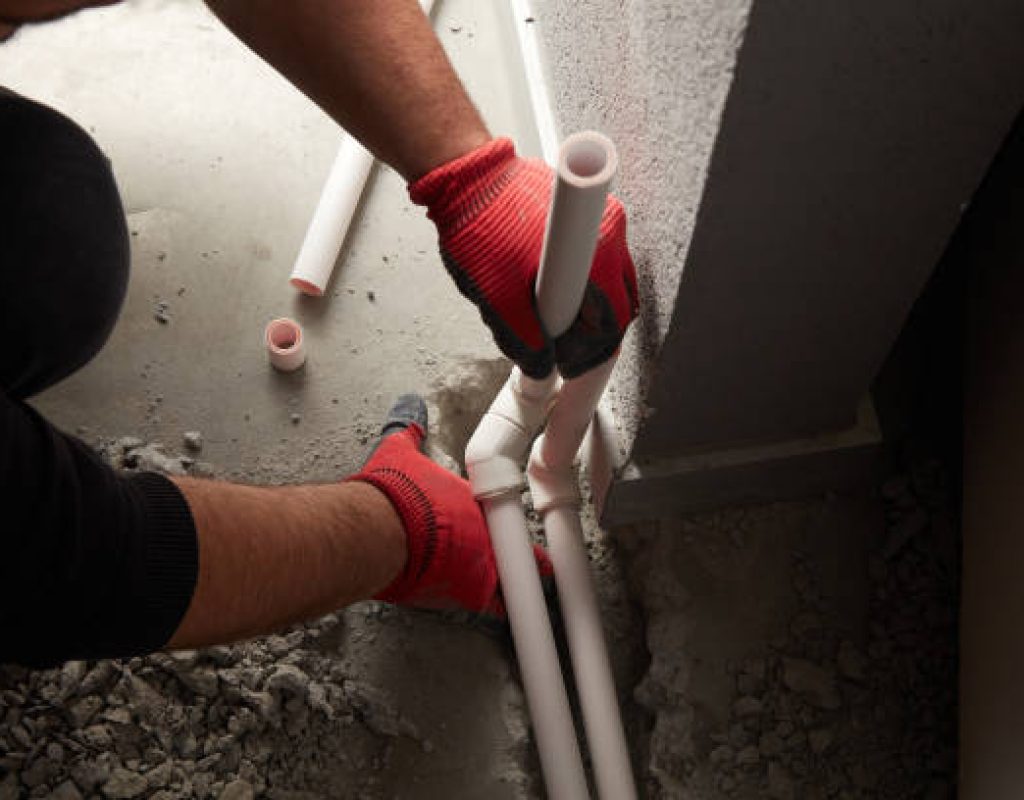 Professional plumber Native Plumbing LLC replacing old water pipes safely