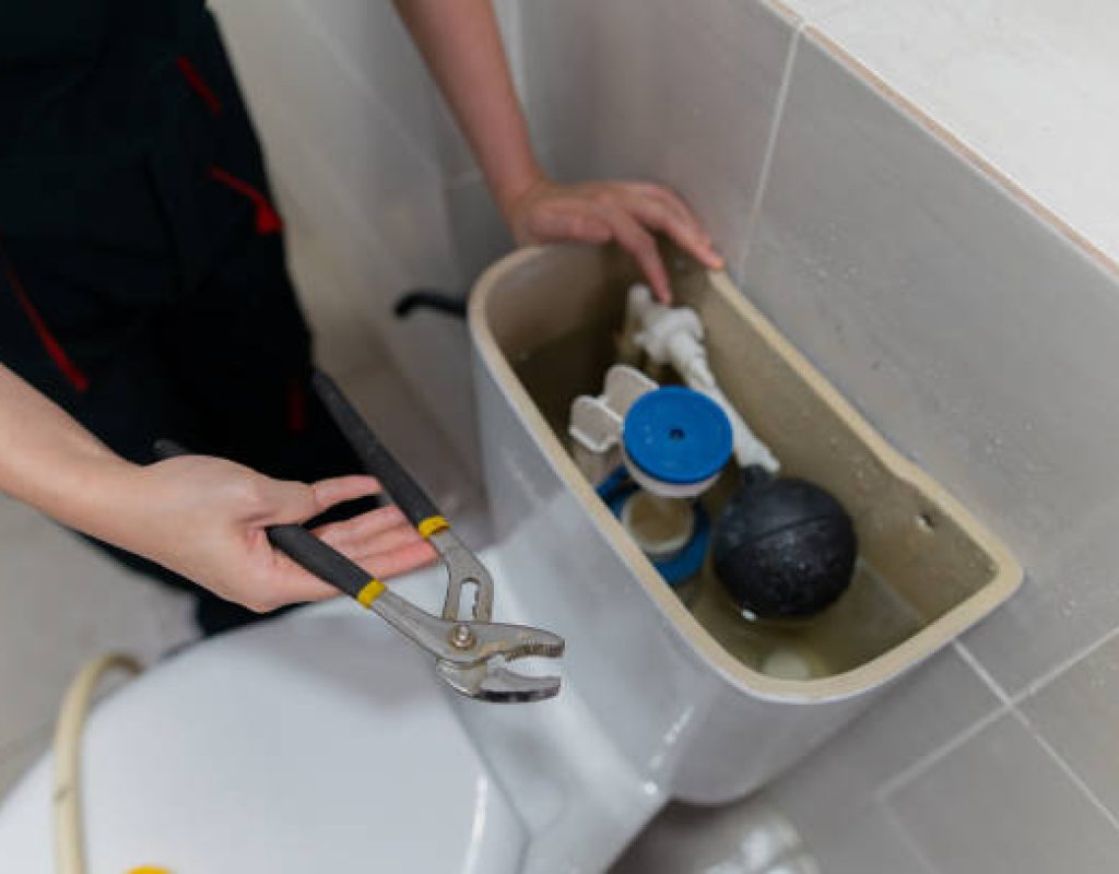 Licensed plumber from Native Plumbing LLC performing pipe maintenance